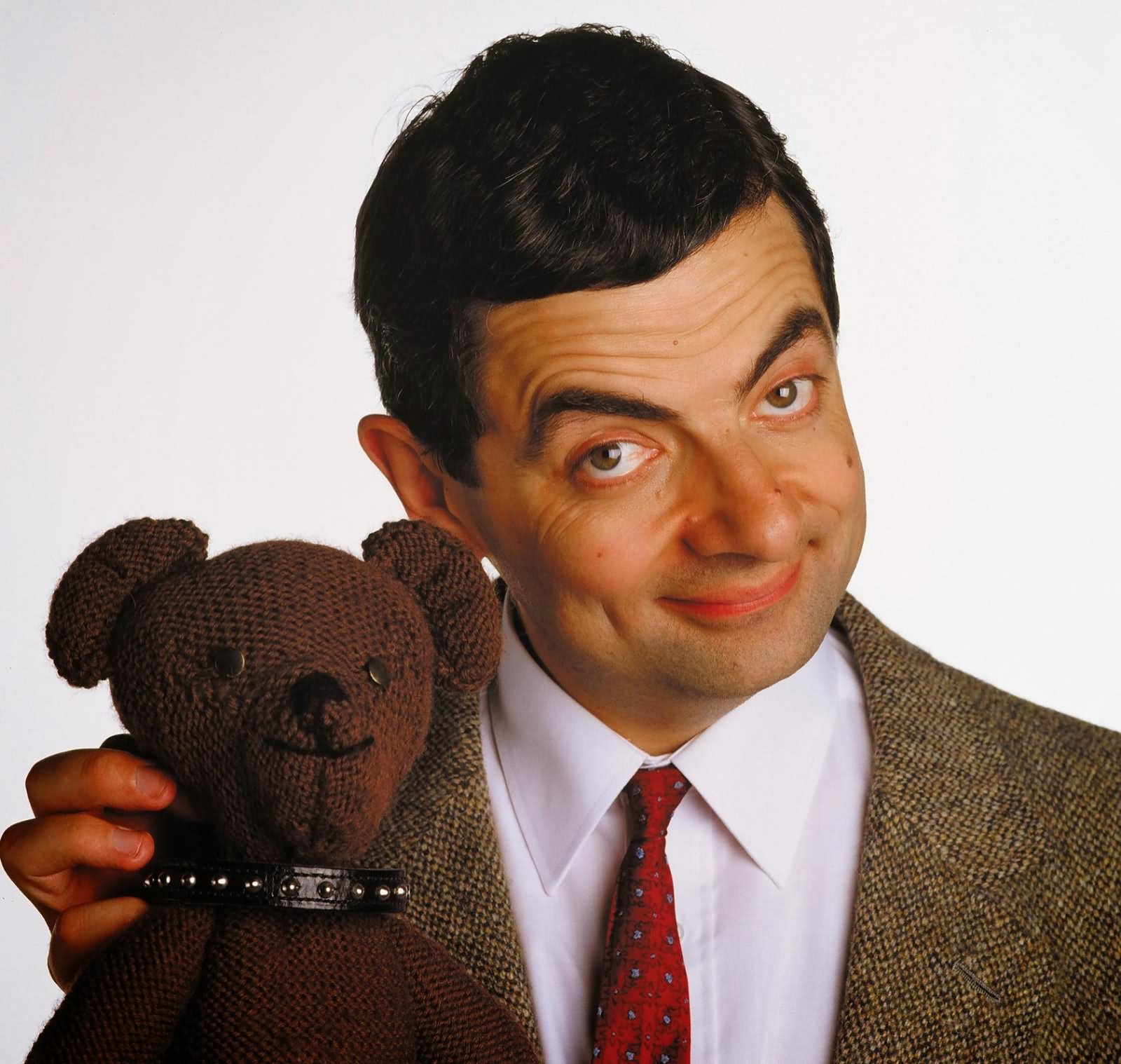 Smiling-Mr-Bean-With-Teddy-Funny-Image