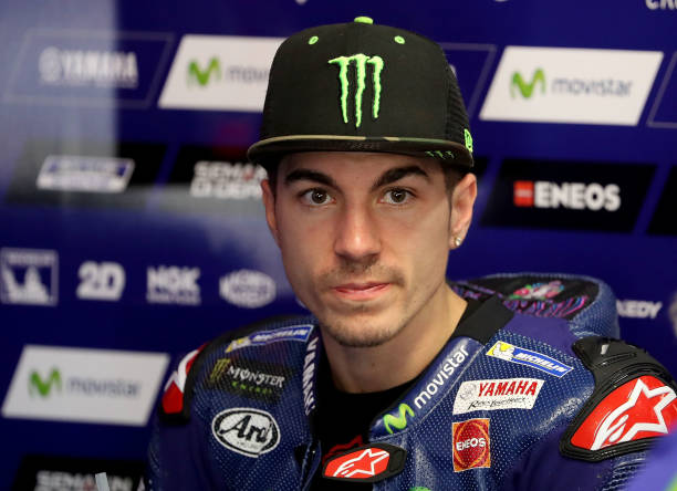 maverick-vinales-of-spain-and-the-movistar-yamaha-motogp-looks-on-picture-id635349464