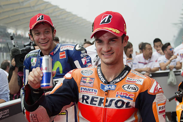 valentino-rossi-of-italy-and-movistar-yamaha-motogp-and-dani-pedrosa-picture-id494039750